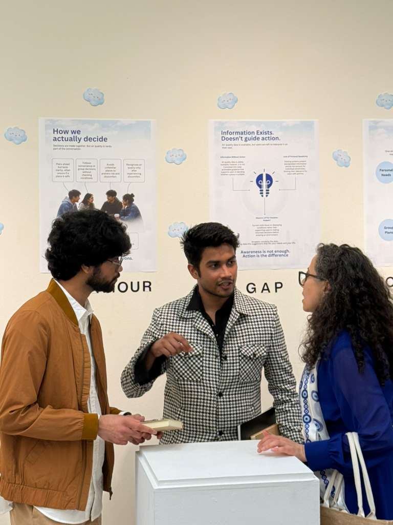 AroundUs exhibition photograph: talking through the gap.